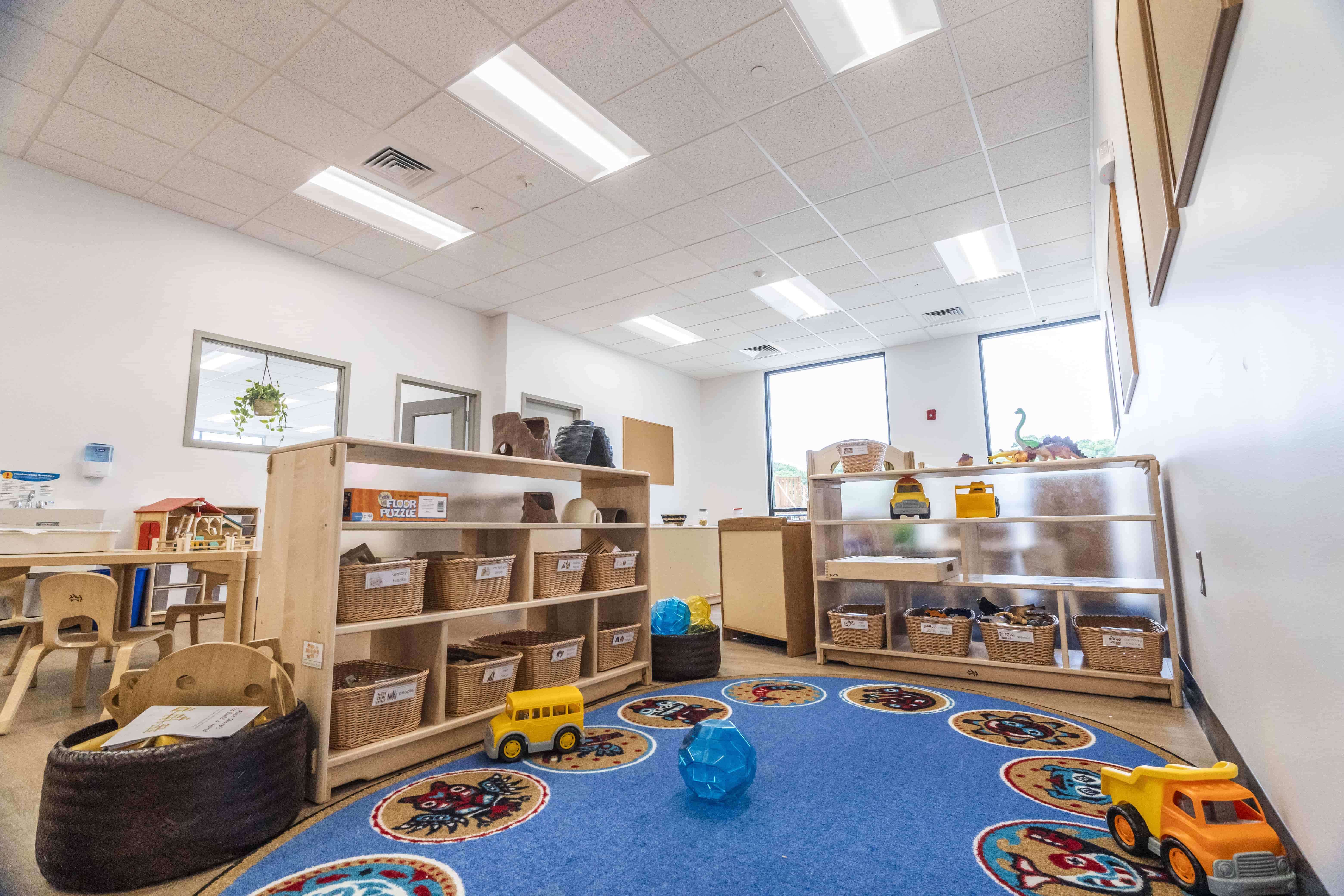 BrightPath's learning spaces with natural materials, promoting interactive exploration in daycare.