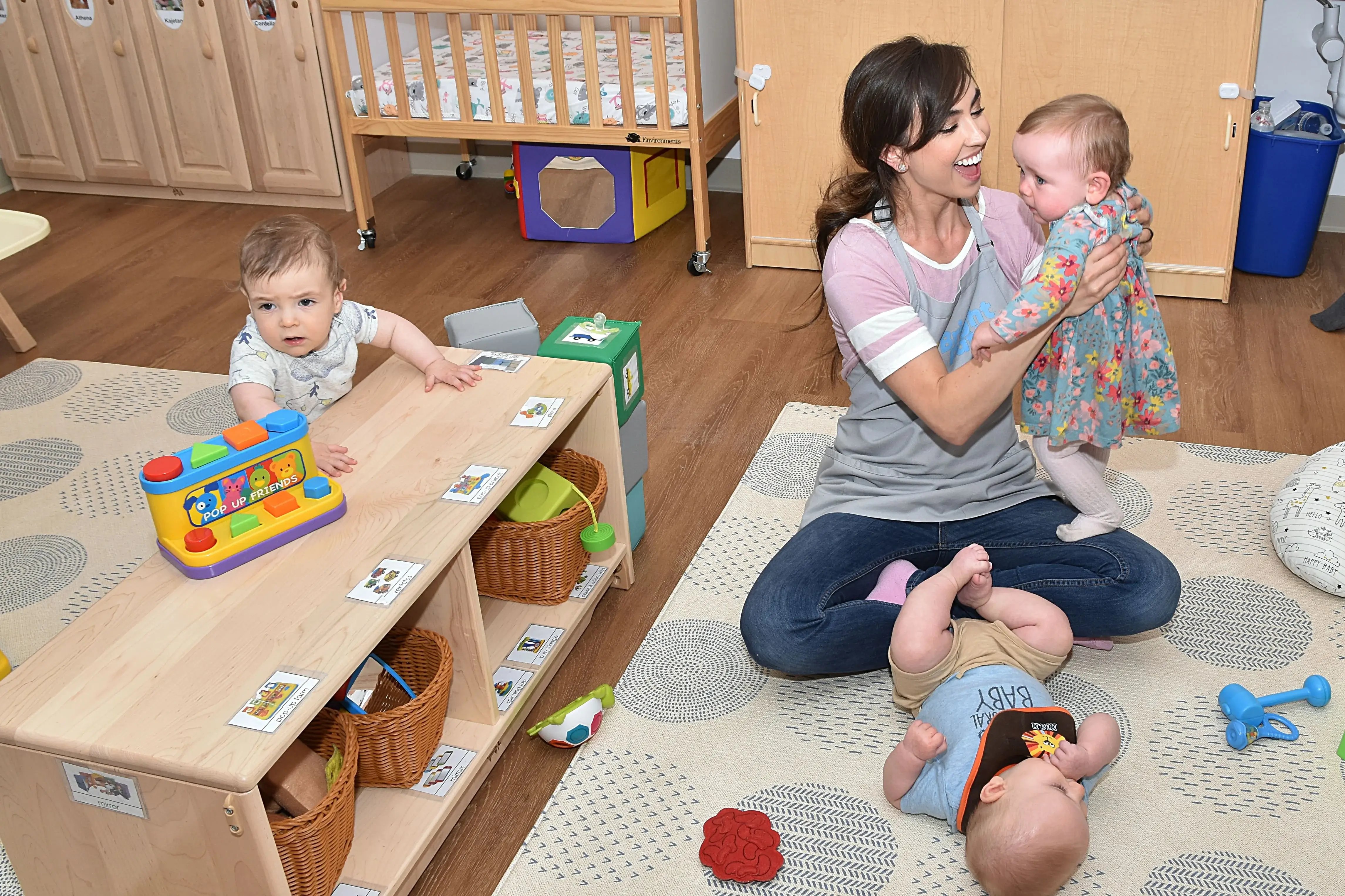 A cozy reading nook inside BrightPath Child Care Center, illustrating the center's commitment to cognitive development.