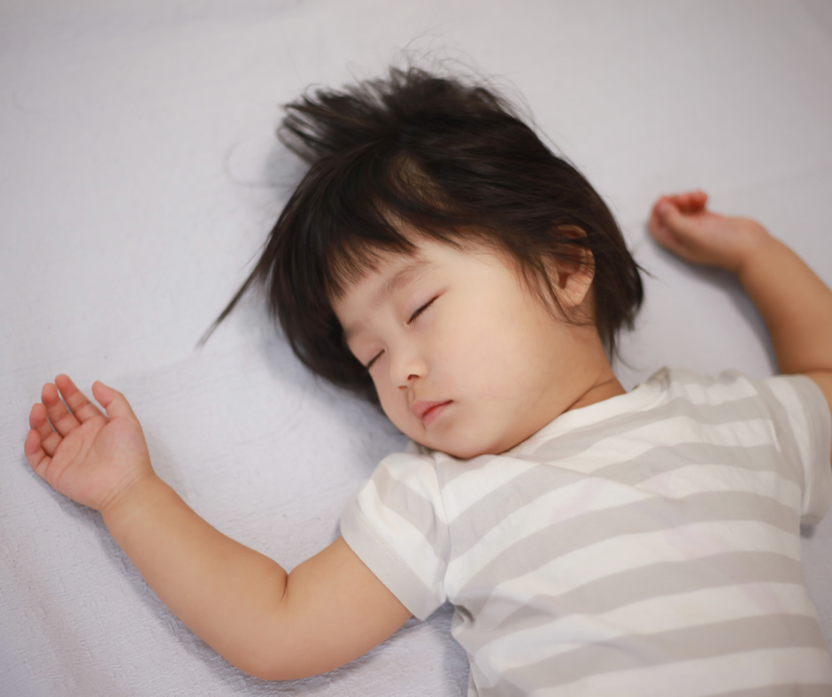 A young child enjoying naptime